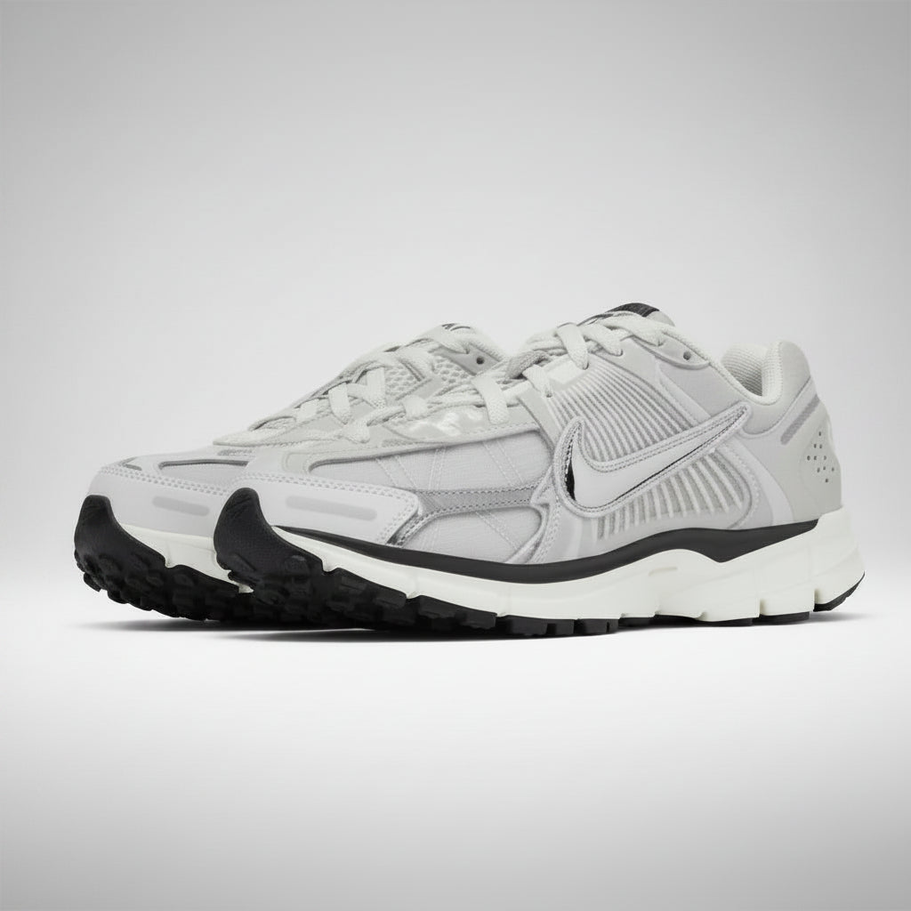 NIKE VOMERO GRIS/PLATA
